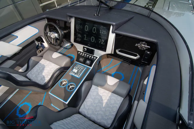 Slide: The Image of 2025 Fountain 34 Thunder Cat boat interior with modern dashboard and seating. - 37