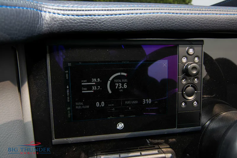 Slide: The Image of Dashboard display of a 2025 Fountain 34 Thunder Cat boat showing fuel statistics. - 40