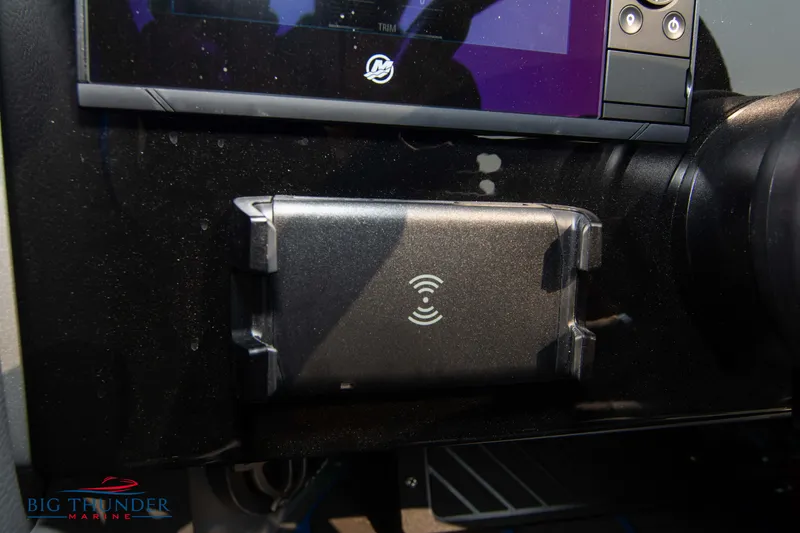 Slide: The Image of Dashboard of 2025 Fountain 34 Thunder Cat with wireless charging pad. - 41