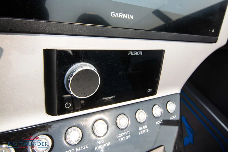 Slide: The Image of Close-up of the control panel in a 2025 Fountain 34 Thunder Cat boat. - 42