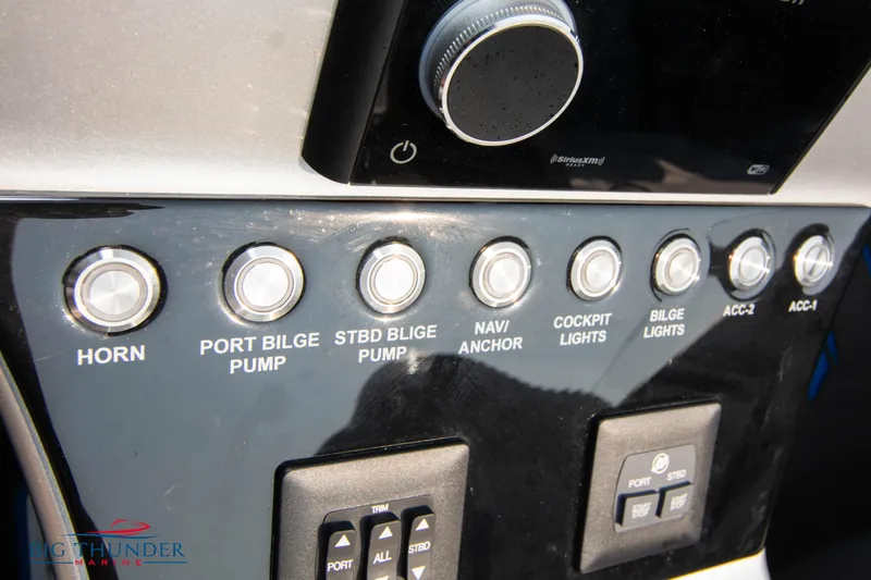 Slide: The Image of Control panel of a 2025 Fountain 34 Thunder Cat boat. - 43