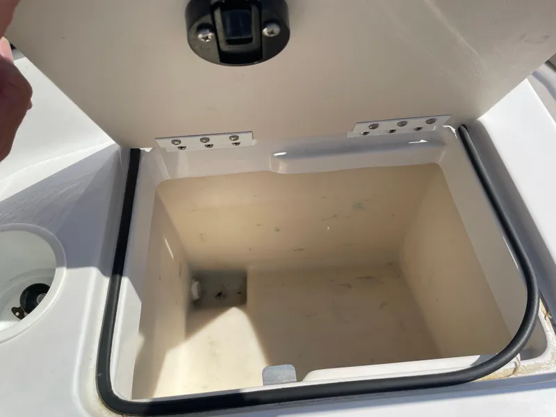 Slide: The Image of Open storage compartment on a 1996 Four Winns 190 Horizon DLX boat. - 28