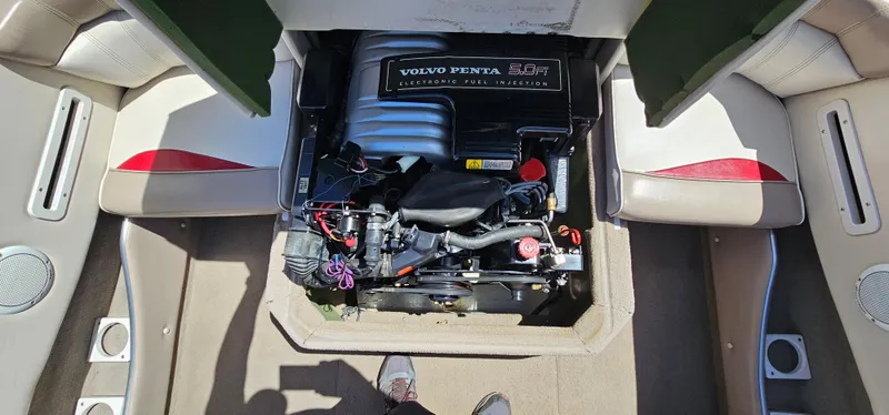 Slide: The Image of 1996 Four Winns 190 Horizon DLX boat engine compartment with Volvo Penta engine. - 32