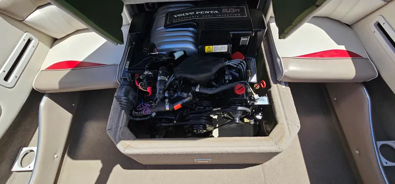 Slide: The Image of 1996 Four Winns 190 Horizon DLX boat engine compartment with Volvo Penta engine. - 33