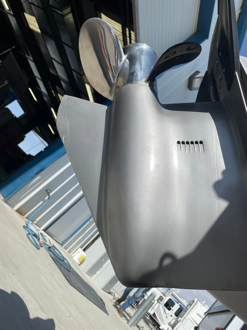 Slide: The Image of Close-up of a 1996 Four Winns 190 Horizon DLX boat propeller in a workshop. - 36