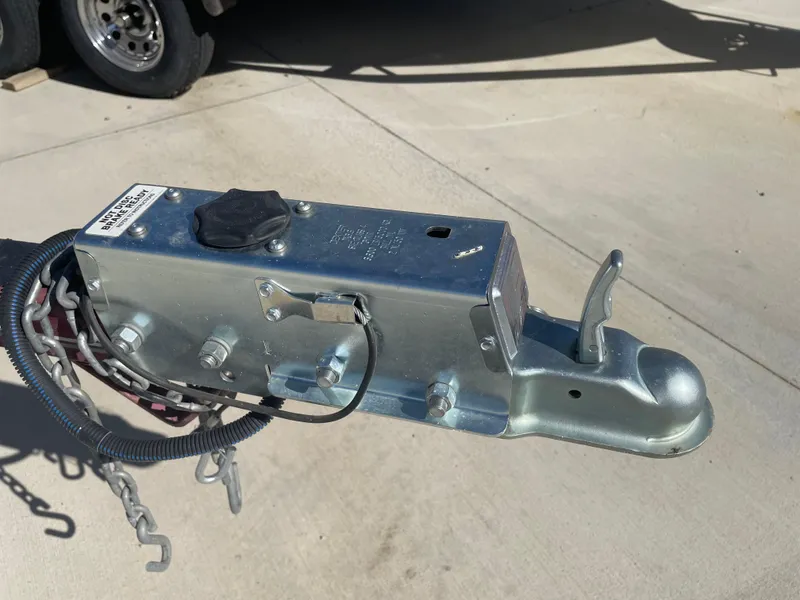 Slide: The Image of Trailer hitch coupler on a 1996 Four Winns 190 Horizon DLX boat trailer. - 37