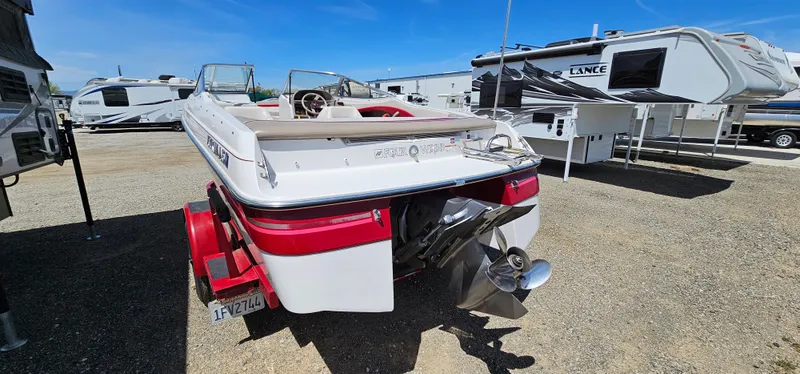 Slide: The Image of 1996 Four Winns 190 Horizon DLX boat on trailer in RV park. - 6