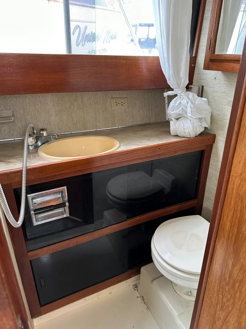 Slide: The Image of Bathroom of Marinette 28 Sport Fish Fly Bridge, 1990 model. - 4