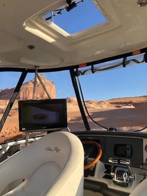 Slide: The Image of Interior of 2007 Sea Ray 36 Sedan Bridge yacht with desert view. - 18