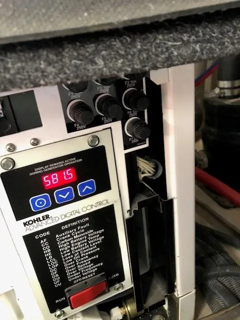 Slide: The Image of Kohler advanced digital control panel on a 2007 Sea Ray 36 Sedan Bridge. - 29