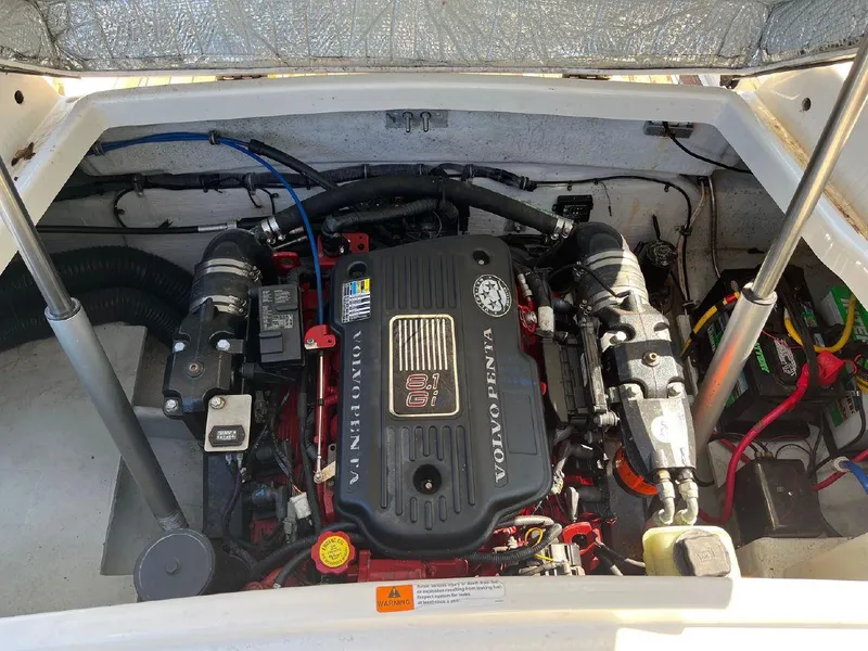 Slide: The Image of 2006 Chris-Craft Launch 25 engine compartment featuring a Volvo Penta 8.1 engine. - 10