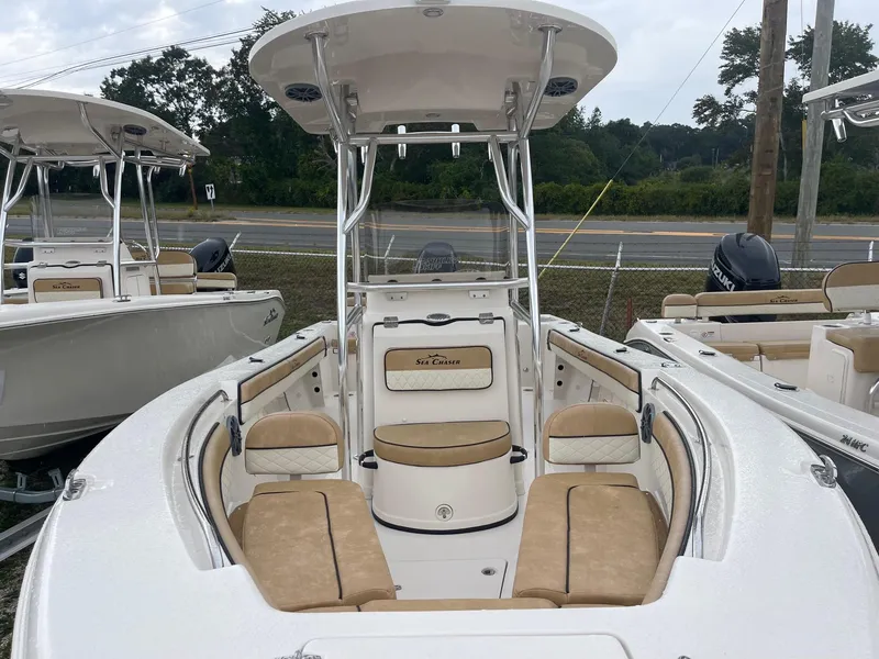 Slide: The Image of 2023 Sea Chaser 22 HFC boat with tan seating and T-top. - 5