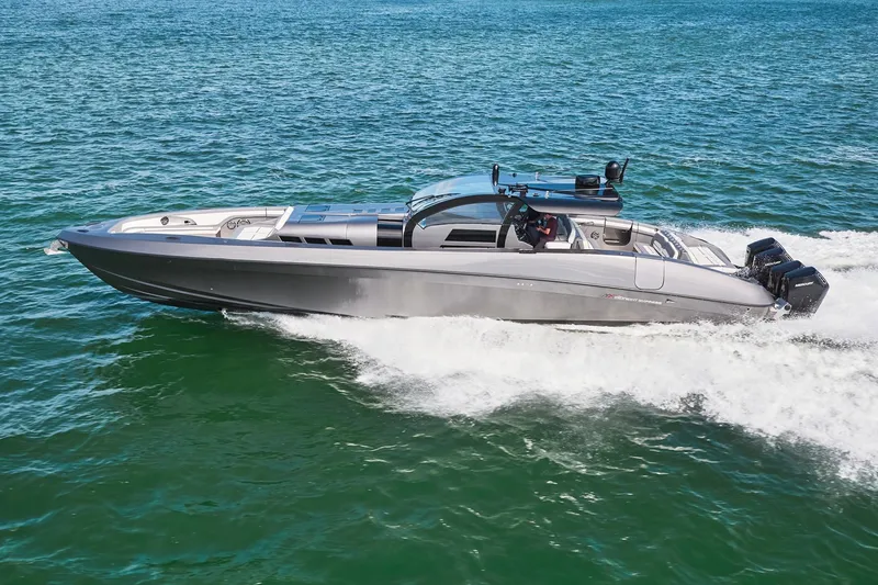 Slide: The Image of 2019 Midnight Express 60' Pied-A-Mer luxury speedboat cruising on the water. - 1