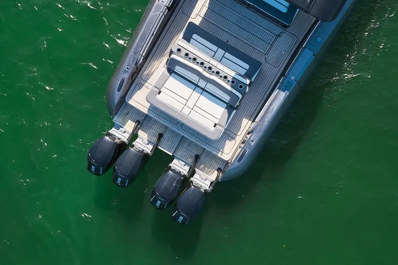 Slide: The Image of Aerial view of 2019 Midnight Express 60' Pied-A-Mer yacht with four outboard engines. - 11