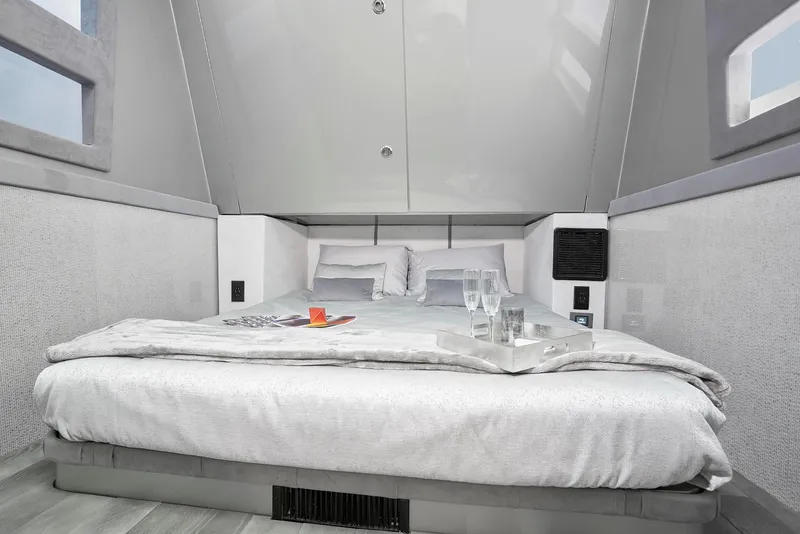 Slide: The Image of Luxurious bedroom interior of 2019 Midnight Express 60' Pied-A-Mer yacht with modern design. - 16