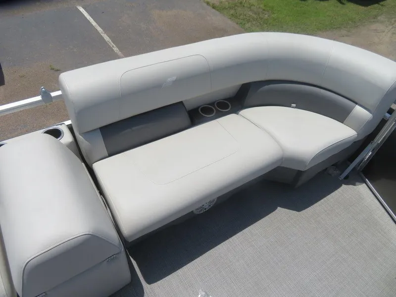 Slide: The Image of 2023 Starcraft LX 16 R boat interior with comfortable seating and cup holders. - 4