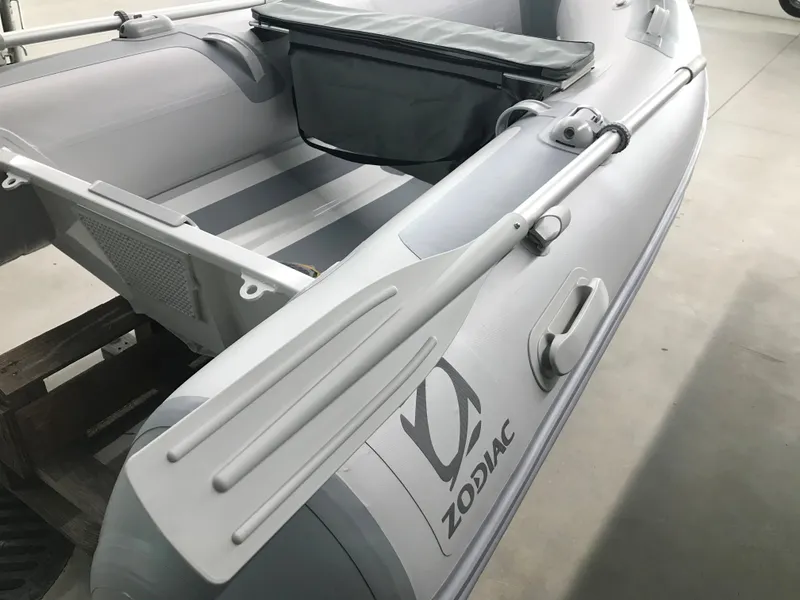 Slide: The Image of 2023 Zodiac Cadet 270 RIB ALU PVC inflatable boat in stock, featuring durable construction and sleek design. - 7
