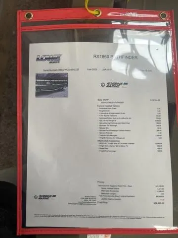Slide: The Image of Alt text: 2023 Lowe RX1860 CC Pathfinder boat specification sheet in a red plastic holder. - 3