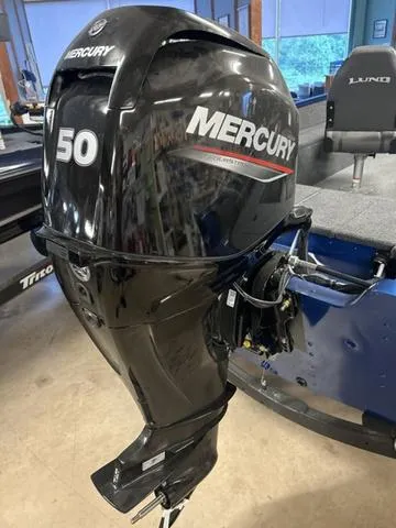 Slide: The Image of 2023 Lund 1650 Angler SS boat interior with two swivel seats and storage compartments. - 8