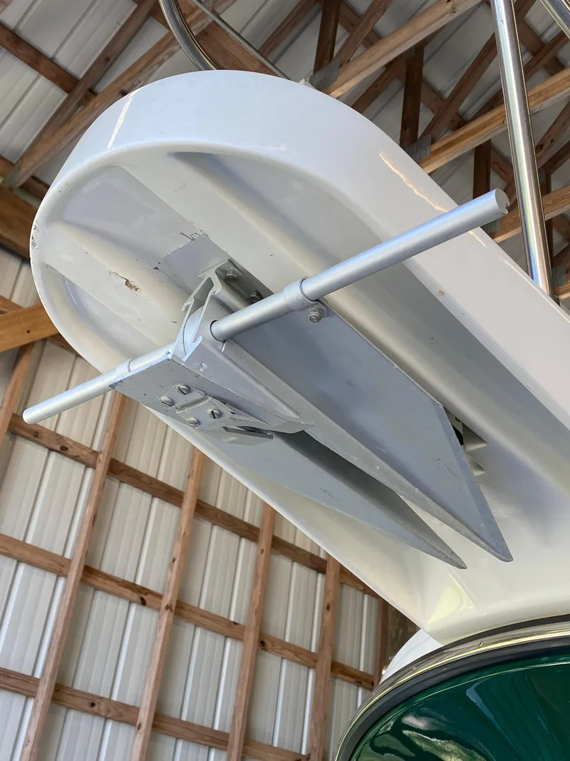 Slide: The Image of 1988 Blackfin 29 Flybridge anchor detail in a wooden boathouse. - 20