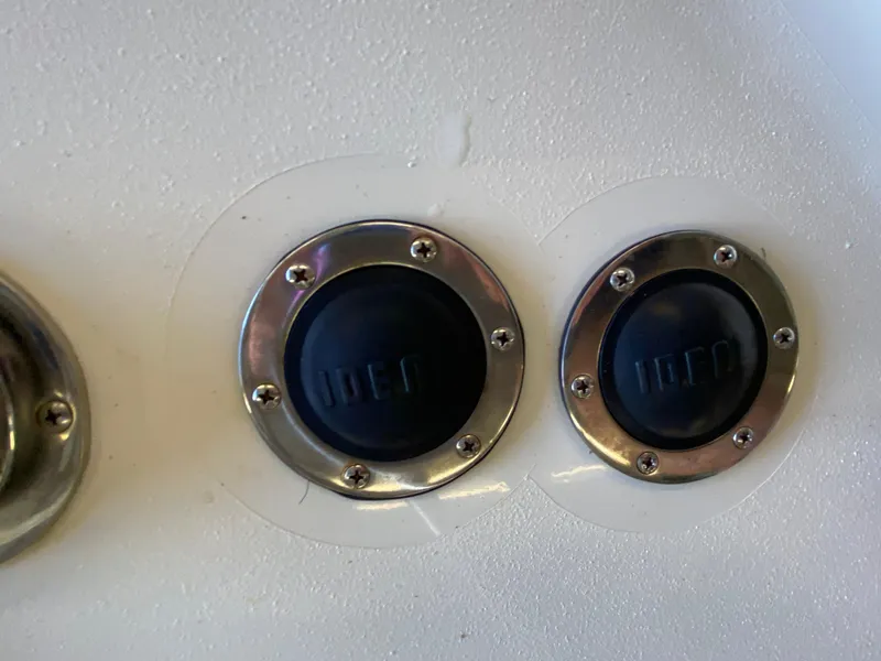 Slide: The Image of Close-up of Blackfin 29 Flybridge 1988 boat controls with metal trim. - 23