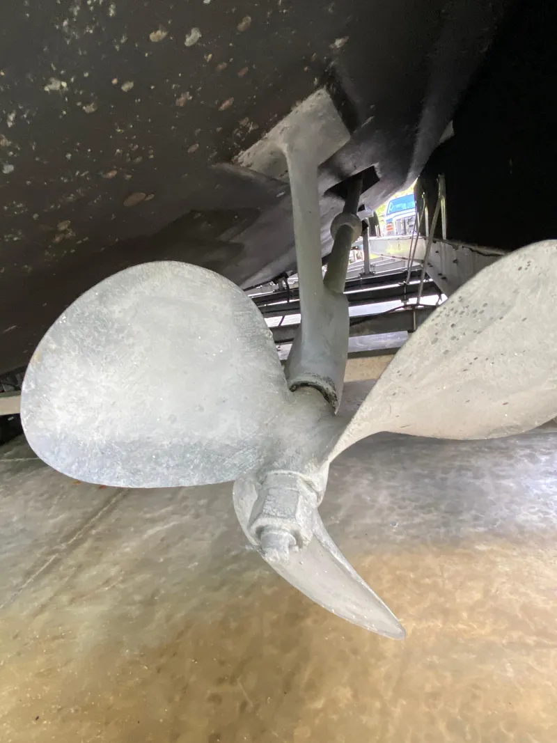 Slide: The Image of Propeller of 1988 Blackfin 29 Flybridge boat, close-up view. - 28