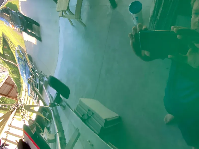 Slide: The Image of Reflection on polished surface of 1988 Blackfin 29 Flybridge boat. - 5