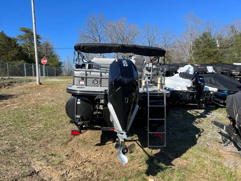 Slide: The Image of 2023 Ranger 2500LS pontoon boat with outboard motor, rear view. - 11