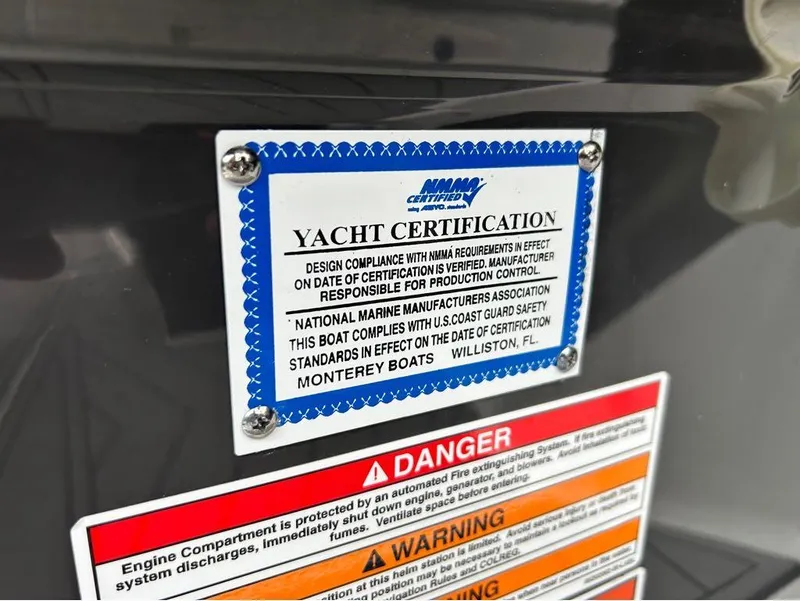 Slide: The Image of 2022 Monterey 298 Super Sport yacht certification and safety warnings. - 13