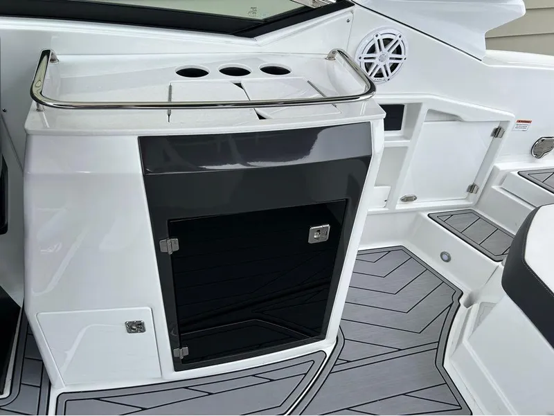 Slide: The Image of 2022 Monterey 298 Super Sport boat interior with sleek cabinetry and modern design. - 16