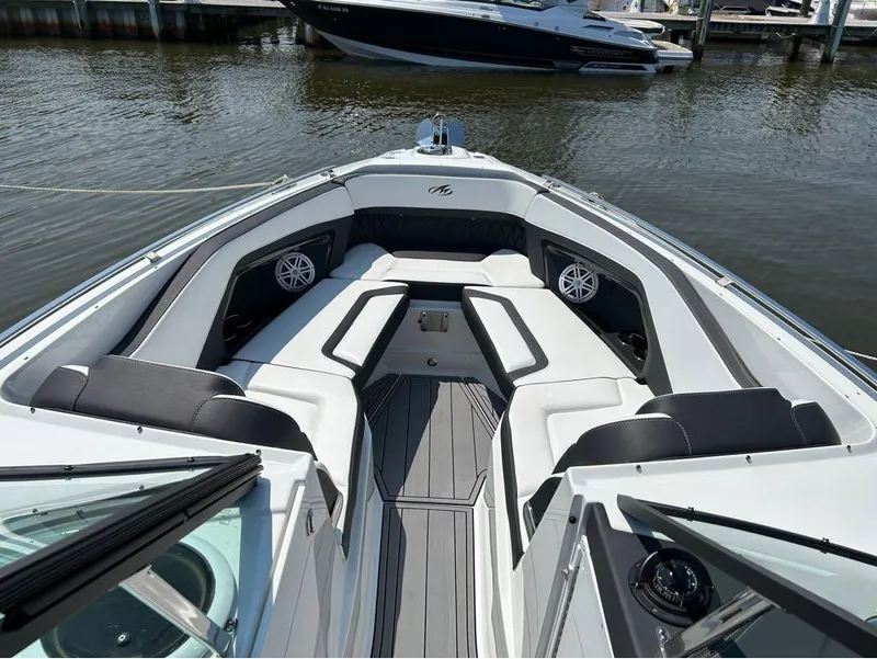 Slide: The Image of 2022 Monterey 298 Super Sport boat interior with sleek seating and modern design. - 20