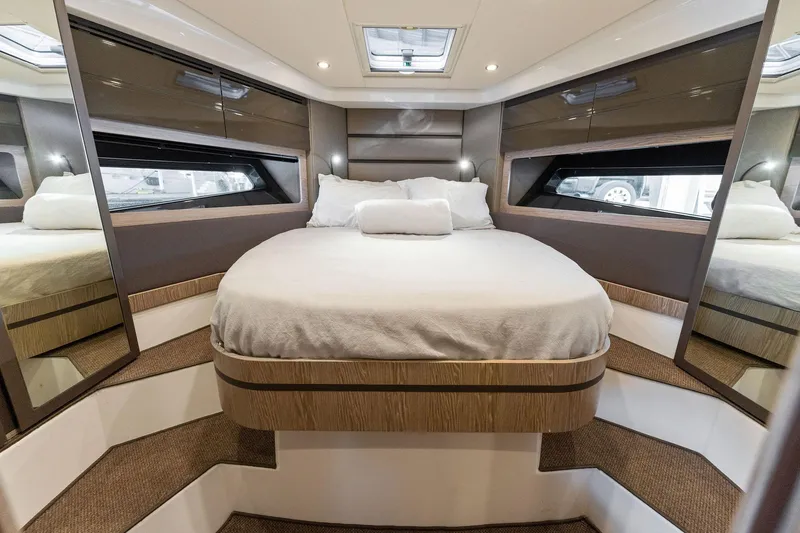 Slide: The Image of Luxurious bedroom interior of 2017 Azimut Atlantis 43 yacht with modern design. - 11