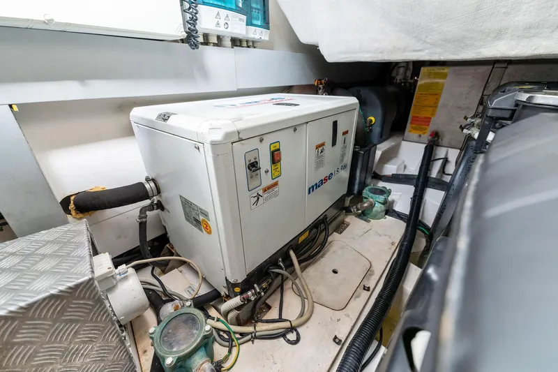 Slide: The Image of Engine room of a 2017 Azimut Atlantis 43 yacht with generator and wiring. - 16