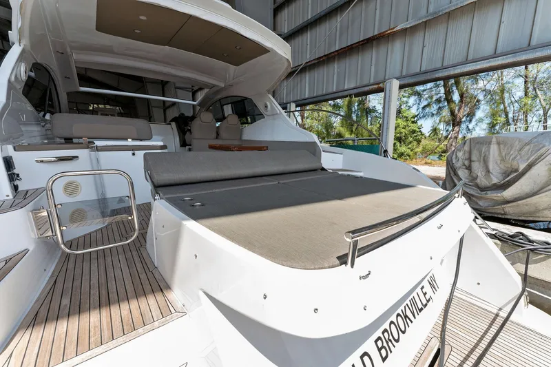 Slide: The Image of 2017 Azimut Atlantis 43 yacht with spacious deck and seating area. - 7