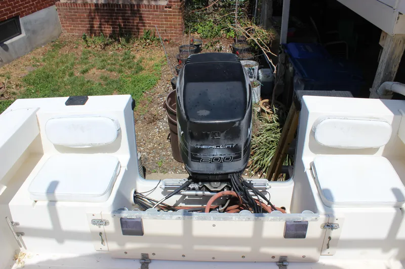 Slide: The Image of 1996 Parker 2110 Walkaround boat with Mercury 200 outboard motor. - 14