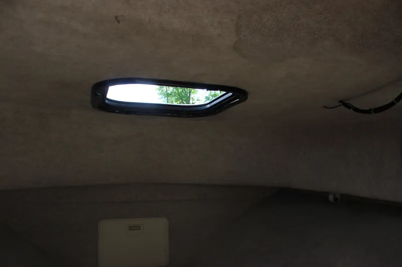 Slide: The Image of Interior cabin roof of 1996 Parker 2110 Walkaround boat with skylight. - 26