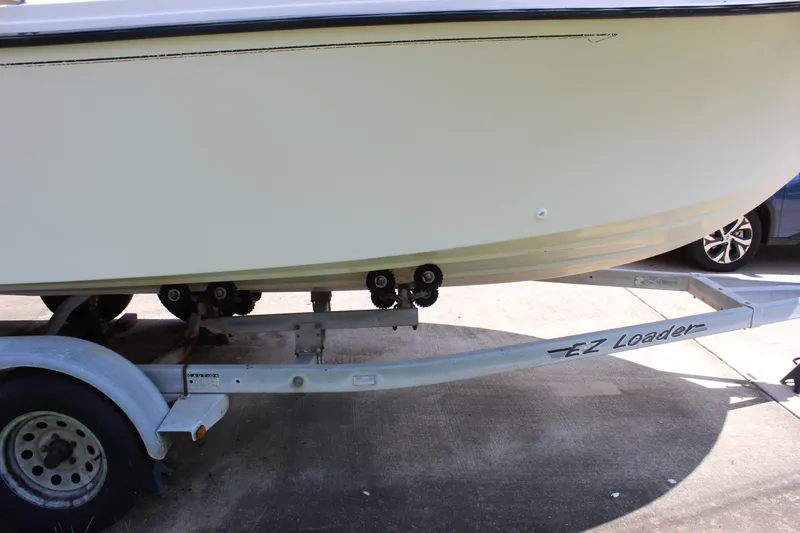 Slide: The Image of 1996 Parker 2110 Walkaround boat on EZ Loader trailer. - 34