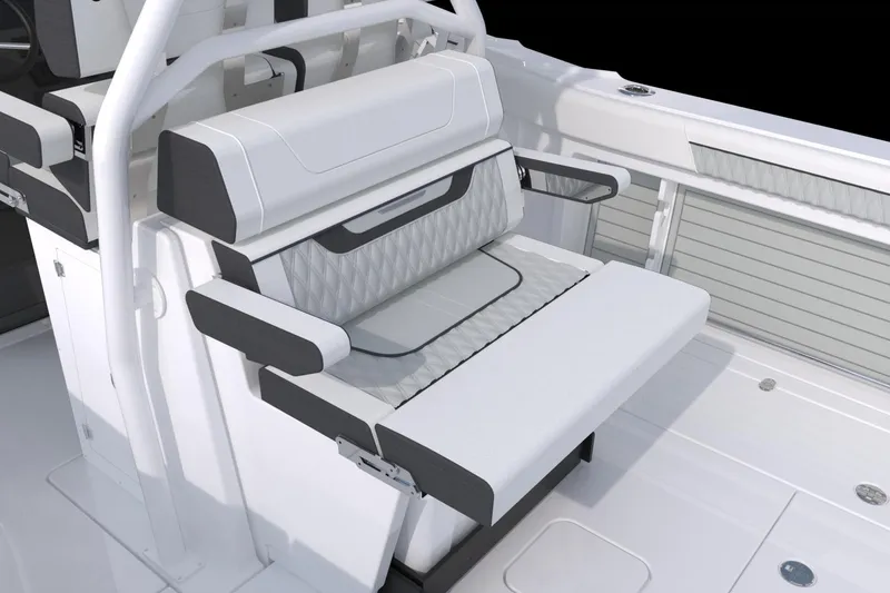 Slide: The Image of 2026 Blackfin 302 CC boat interior with modern white seating and sleek design. - 10