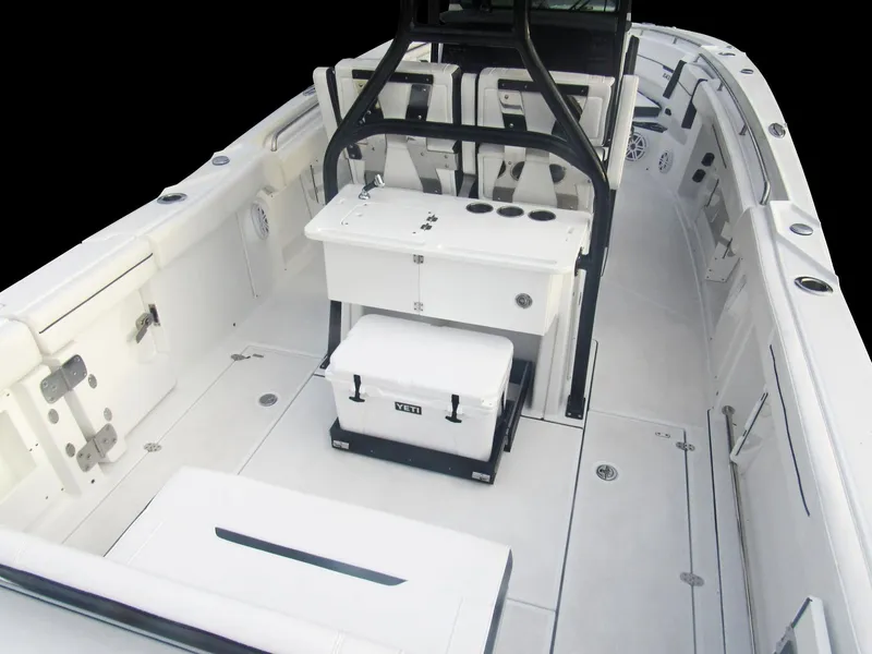 Slide: The Image of 2026 Blackfin 302 CC boat interior with seating and storage compartments. - 12