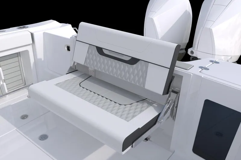 Slide: The Image of 2026 Blackfin 302 CC boat with foldable seating and dual outboard engines. - 14