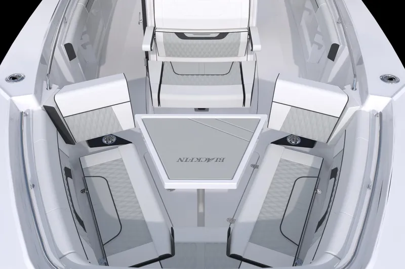 Slide: The Image of 2026 Blackfin 302 CC boat interior with sleek seating and modern design. - 7