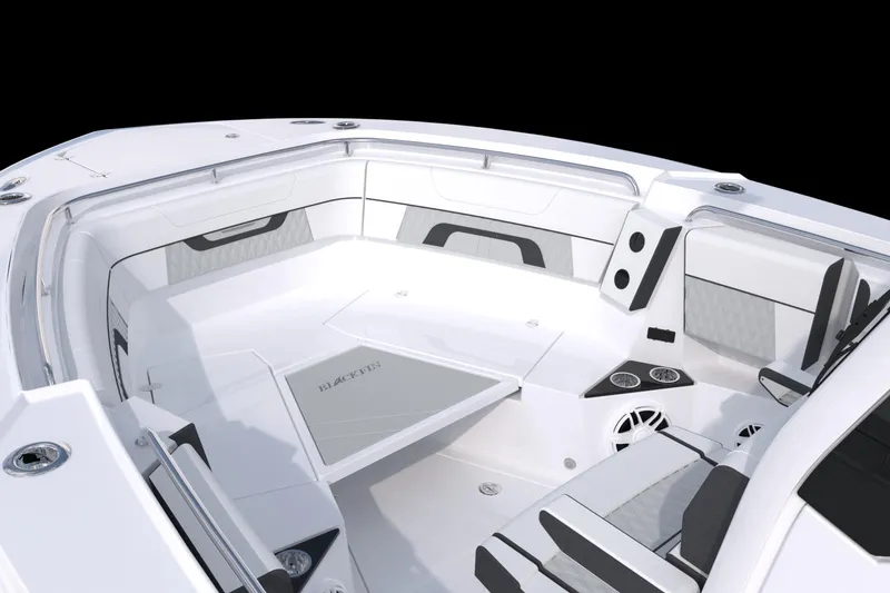 Slide: The Image of 2026 Blackfin 302 CC boat interior with sleek seating and modern design. - 8