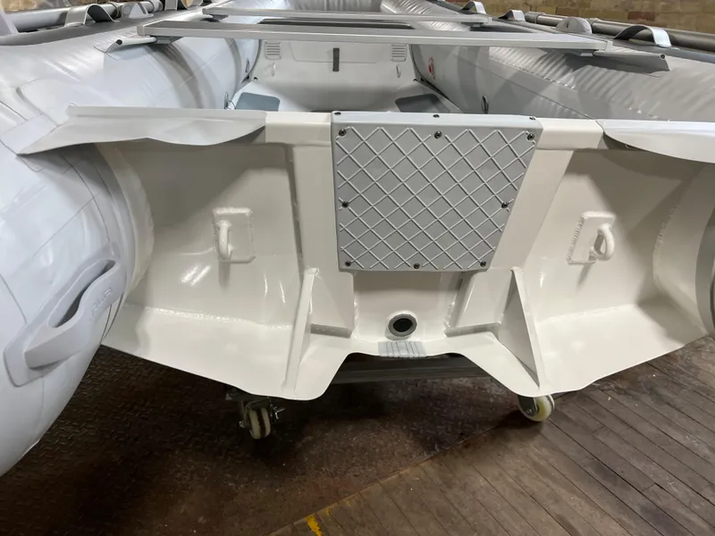 Slide: The Image of 2023 Gala A330D inflatable boat interior, showing the transom and hull details. - 1