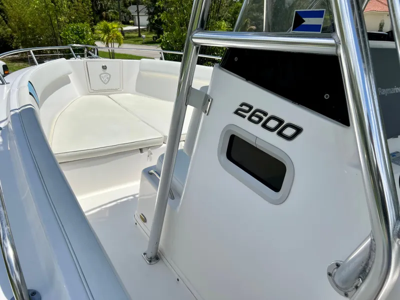 Slide: The Image of 2005 Century 2600 Center Console boat interior with seating and stainless steel railings. - 17