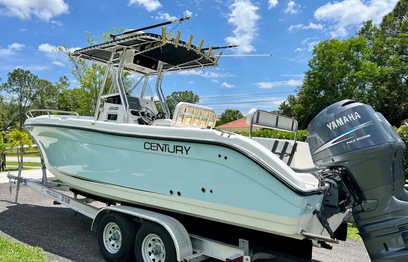 Slide: The Image of 2005 Century 2600 Center Console boat on trailer with Yamaha outboard motor. - 3