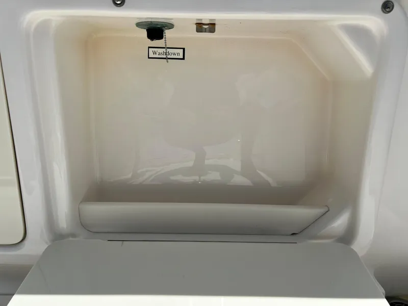 Slide: The Image of 2005 Century 2600 Center Console washdown compartment. - 30