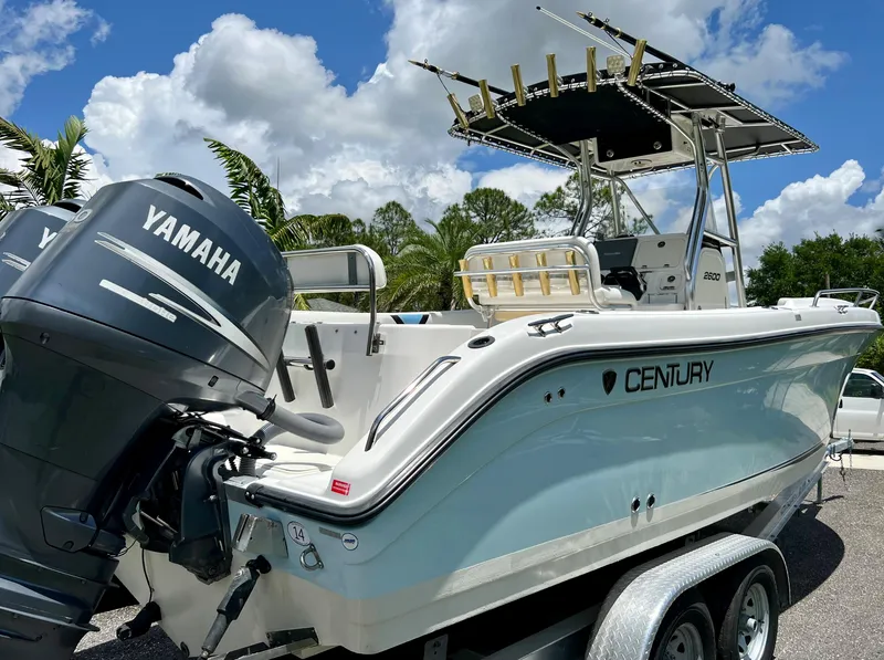 Slide: The Image of 2005 Century 2600 Center Console boat with Yamaha outboard motor. - 9