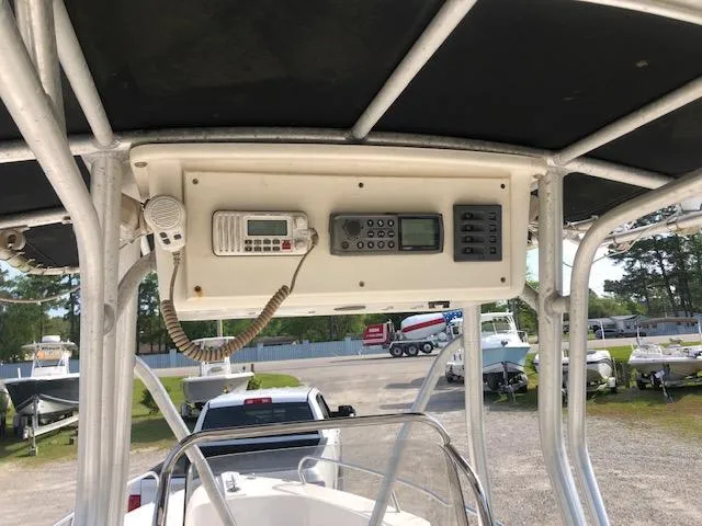 Slide: The Image of May-Craft 2000 CC 2005 boat console with radio and navigation equipment. - 12
