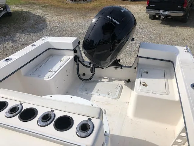Slide: The Image of 2005 May-Craft 2000 CC boat with outboard motor and rod holders. - 9