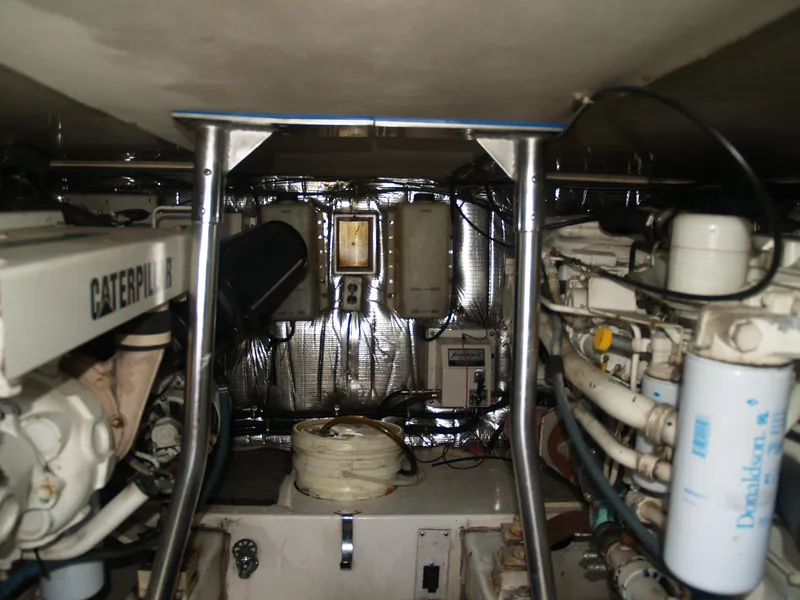 Slide: The Image of Engine room of a 1999 Ocean Yachts vessel with Caterpillar engine. - 14
